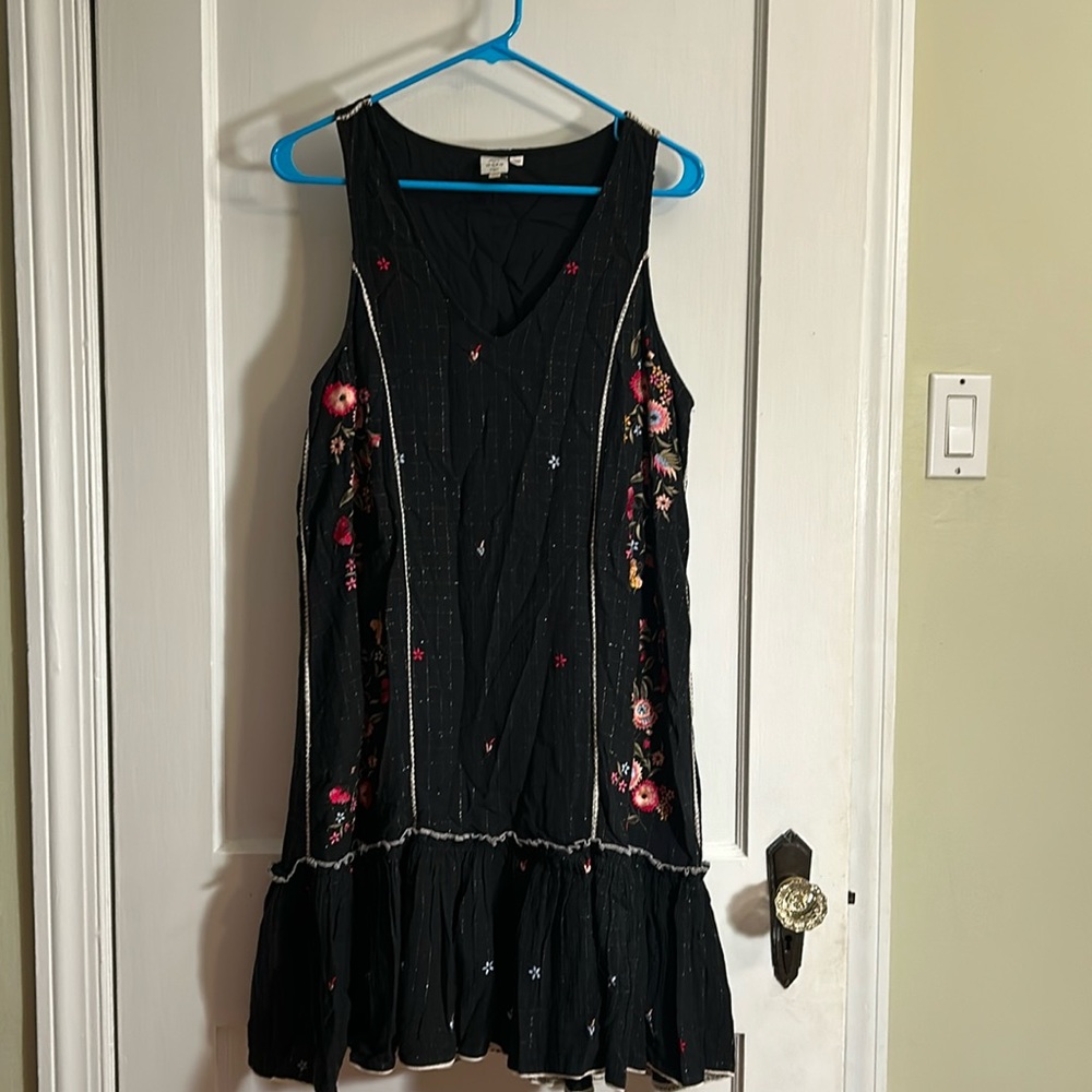 Embroidered dress with flower embellishment